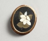 A GOLD OVAL BROOCH, with pietra dura inlaid panel.