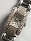 A VERY GOOD LADIES DIAMOND SET CHOPARD 
