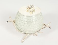 A FROSTED GLASS HONEY JAR with plated mounts.