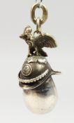 A GOOD MODERN RUSSIAN SILVER EGG SHAPE PENDANT, mounted with a helmet. 1.5ins high.