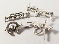 FOUR SILVER HUNT STOCK PINS.