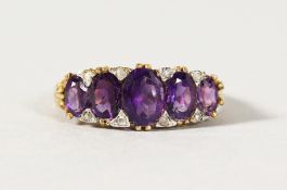 A SILVER AND GOLD PLATED AMETHYST AND DIAMOND RING.