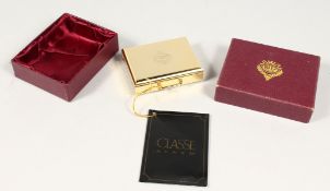 A RITZ CLUB TRAVELLING CLOCK in a case.