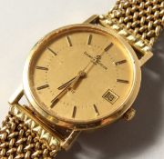 A GENTLEMAN'S 18CT GOLD BAUME MERCIER WRISTWATCH AND BRACELET. No. 1074677 73225.