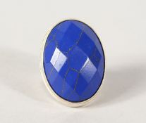 A SILVER AND LAPIS RING.