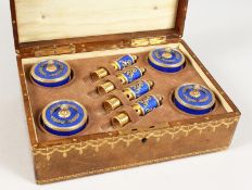 A VERY GOOD RUSSIAN SILVER, ENAMEL AND DIAMOND SET OF FOUR BRUSHES AND HOLDERS with blue enamel,