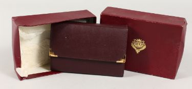 TWO SETS OF RITZ CLUB PLAYING CARDS in a leather wallet and box.