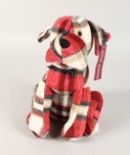 A TARTAN DOG DOOR STOP.