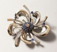 AN 18CT WHITE GOLD, DIAMOND AND SAPPHIRE BROOCH.