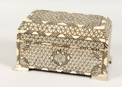 A VERY GOOD GOA MOTHER-OF-PEARL CASKET, mirror inside the lid and supported on bracket feet. 10ins