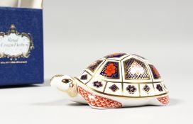 A ROYAL CROWN DERBY TURTLE PAPERWEIGHT with gold stopper, box and certificate.