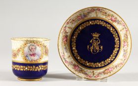 A SEVRES CRESTED RICH BLUE CUP AND SAUCER. Sevres mark in blue.