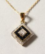 A 9CT GOLD, SAPPHIRE AND DIAMOND NECKLACE.