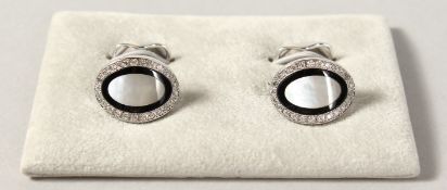 A VERY GOOD PAIR OF 18CT WHITE GOLD DIAMOND AND MOTHER-OF-PEARL CUFFLINKS.