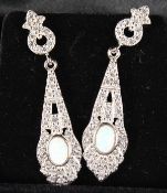 A PAIR OF SILVER AND OPAL DECO DESIGN DROP EARRINGS.