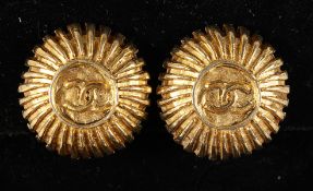 A PAIR OF CHANEL DOUBLE C GILT EARRINGS, in a Chanel box.