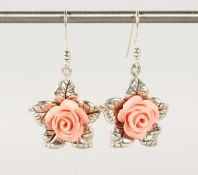 A PAIR OF SILVER AND CORAL FLOWER EARRINGS.