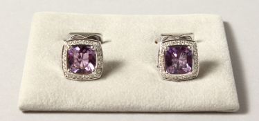 A VERY GOOD PAIR OF 18CT WHITE GOLD AMETHYST AND DIAMOND SET CUFFLINKS. 16.5 grams.