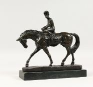 A GOOD BRONZE HORSE AND JOCKEY on a marble base. 10.5ins high.