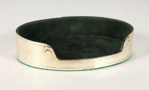 A SILVER OVAL JEWELLERY STAND with velvet interior. 7ins long.