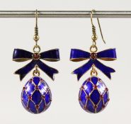 A PAIR OF RUSSIAN BLUE ENAMEL AND RIBBON EGG EARRINGS.