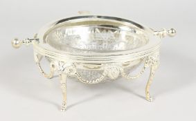 A SILVER PLATE ROLLOVER LID AND GLASS BUTTER DISH.