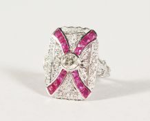 A VERY GOOD 18K GOLD, RUBY AND DIAMOND DECO STYLE PANEL RING.