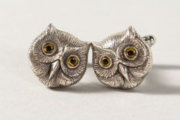 A PAIR OF SILVER OWL CUFFLINKS.