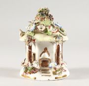 A COALPORT PORCELAIN FLOWER ENCRUSTED PASTILLE BURNER. 4.5ins high.