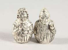 A PAIR OF .925 SILVER PLATE PUNCH & JUDY SALT AND PEPPER.