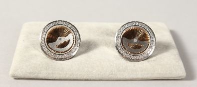 A VERY GOOD PAIR OF 18CT WHITE GOLD DIAMOND SET CUFFLINKS. 22 grams.