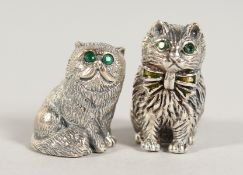 TWO CAST SILVER CATS.