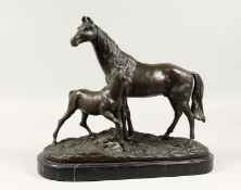 AFTER P. J. MENE. A GOOD BRONZE MARE AND FOAL. Signed, on a marble base. 15ins long.