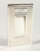 A SILVER CARD HOLDER Engraved J.R. 3ins x 2ins in a purple Aspreys' box. Maker SJR