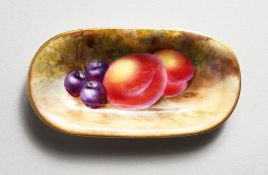 A ROYAL WORCESTER SMALL OVAL DISH painted with fruit, date code 1939.