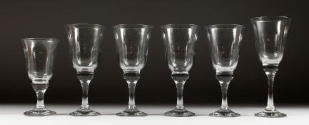 SIX HEAVY WINE GLASSES in three sizes.