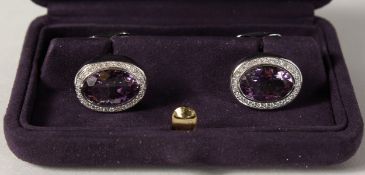 A VERY GOOD PAIR OF 18CT WHITE GOLD DIAMOND AND AMETHYST CUFFLINKS.
