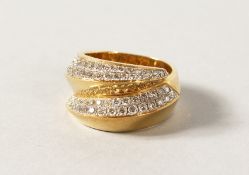 AN 18CT GOLD DIAMOND SET RING.