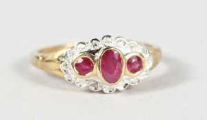 A 9CT GOLD, RUBY AND DIAMOND RING.