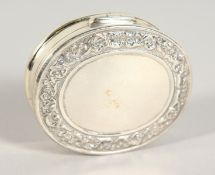 A SILVER SECRET NUDE OVAL PILL BOX.