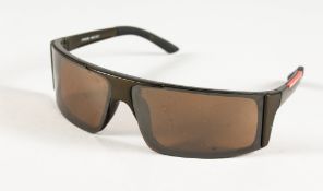 PRADA SUNGLASSES, in a grey box.