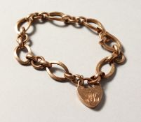 A 9CT GOLD BRACELET with padlock.