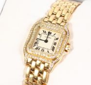 A SUPERB 18CT GOLD LADIES CARTIER WRISTWATCH AND BRACELET with two rows of diamonds, No. 107000N