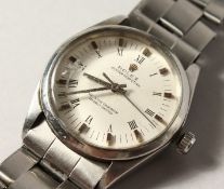 A ROLEX OYSTER PERPETUAL STAINLESS STEEL WRISTWATCH AND BRACELET.