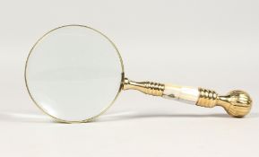 A MAGNIFYING GLASS with mother-of-pearl handle.