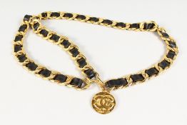A GOOD GILT METAL AND LEATHER CHANEL CHAIN BELT.