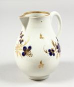 AN 18TH CENTURY WORCESTER SPARROW BEAK JUG decorated with blue and gilt flowers and leaves.