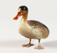A SUPERB RUSSIAN COLOURED HARDSTONE DUCK with gold feet. 4ins long.