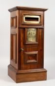 A GOOD SQUARE MAHOGANY LETTER BOX, with letter box and door. 20ins high.
