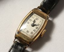 A LADIES 9CT GOLD ROLEX WRISTWATCH.